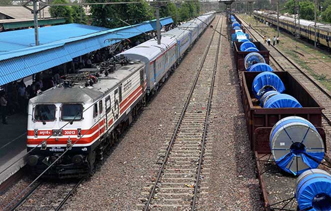 Delhi- Agra high speed train passes through Faridabad Railway Station during a trial run on July 3, 2014.