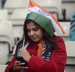 A woman wears an Indian flag