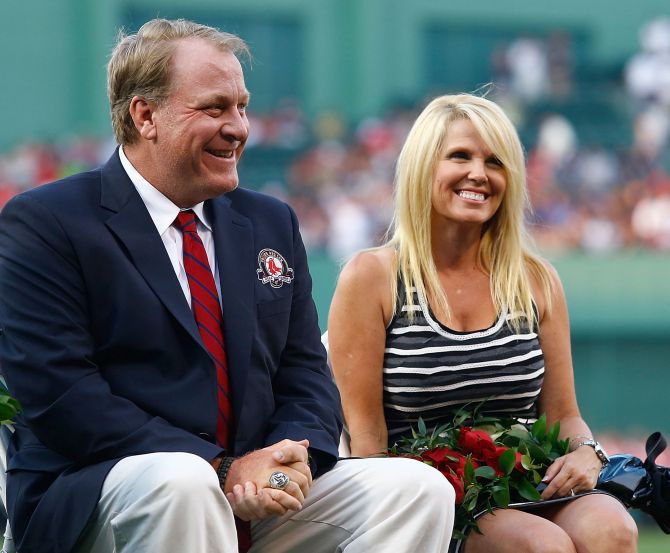 Former Boston Red Sox pitcher Curt Schilling #38 sits with his wife, Shonda Schilling.