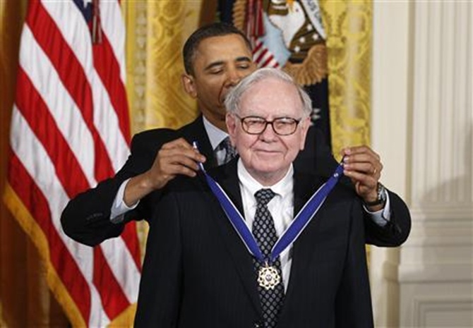 President Obama awards the Medal of Freedom to recipient Warren Buffett.