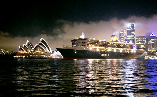 The Queen Mary 2 sets sail past the Sydney Opera House, February 19, 2014. Entering service in 2004, the flagship of the Cunard Line is celebrating its 10th anniversary with a three-week cruise that will circumnavigate Australia.