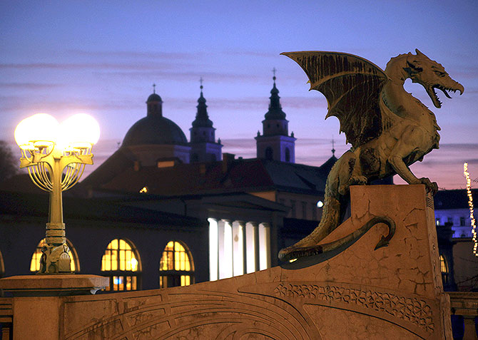 Statue of a dragon is seen on the dragon bridge over river Ljubljanica.