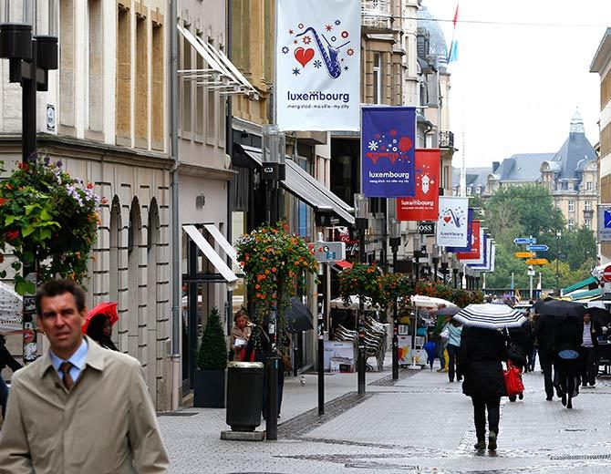 Pedetrians walk in the centre of the city of Luxembourg.