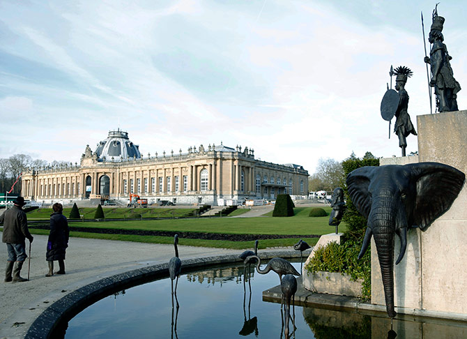A modern sculpture by Belgian artist Tom Frantzen shows former Belgian King Leopold II surrounded by animals and African warriors in the park of the Royal Museum for Central Africa in Tervuren.