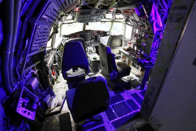 The cockpit, which Bruce Campbell is currently renovating, is seen in his Boeing 727 home.