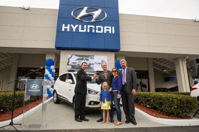  Tustin Hyundai celebrates the first Hyundai Tucson Fuel Cell customer, Timothy Bush, with a key hand-off ceremony at the dealership. 
