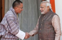 Bhutanese PM Tshering Tobgay shakes hands with PM Narendra Modi.