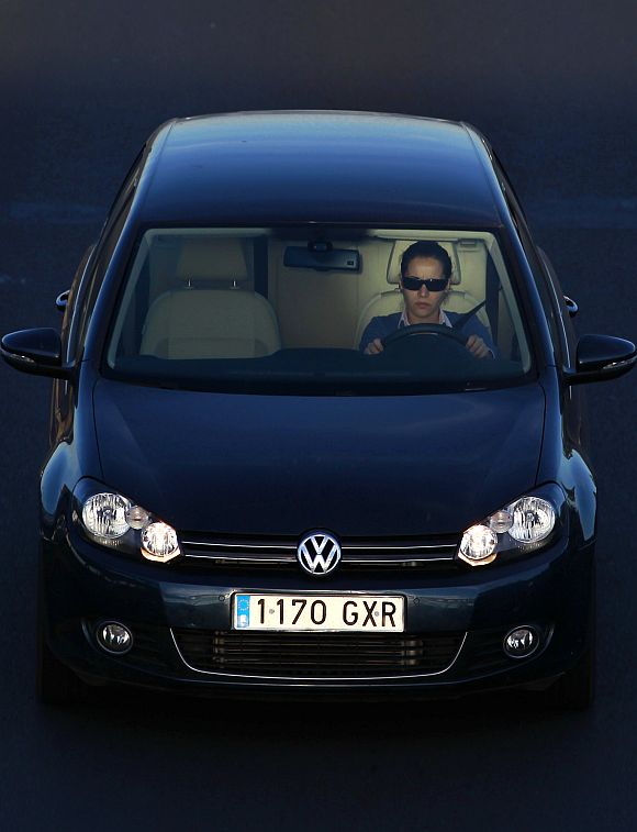 A woman driving a car.
