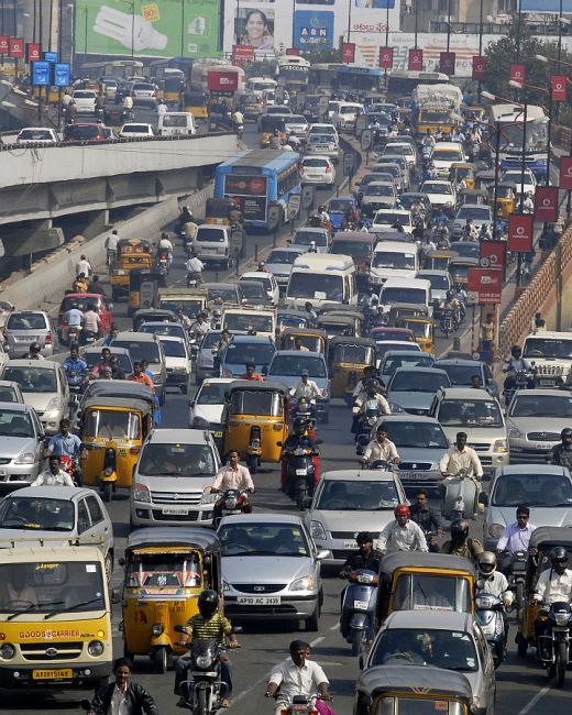 Vehicles move slowly during morning rush hour in the southern Indian city of Hyderabad.