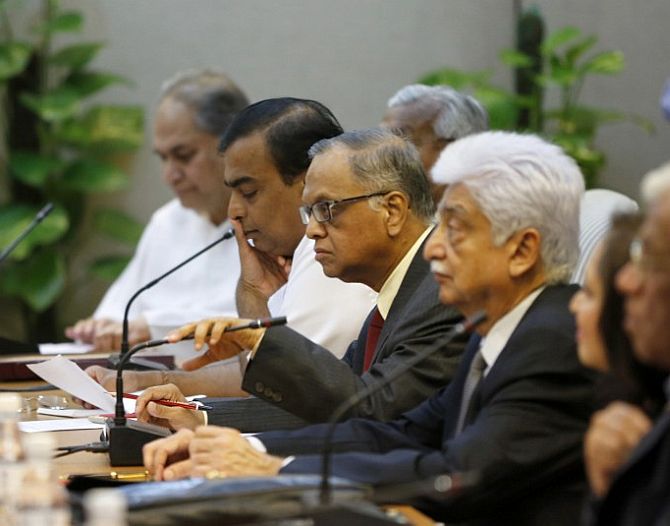 Rahul Bajaj, chairman of the Bajaj Group, Mukesh Ambani, chairman of Reliance Industries Limited, Infosys founder NR Narayana Murthy and Wipro Chairman Azim Premji (L-R) attend a meeting with India's Prime Minister Manmohan Singh (not seen).