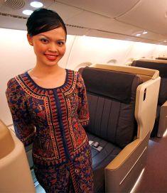 A stewardess posing for a photo in the business class cabin Airbus A380 superjumbo after it landed in Singapore.