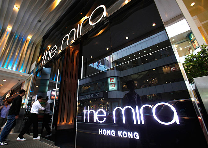 Visitors walk into The Mira Hotel, where 29-year-old former CIA employee Edward Snowden was reported to have checked out in Hong Kong.