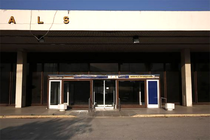 An entrance to the arrivals area is seen at the east terminal.