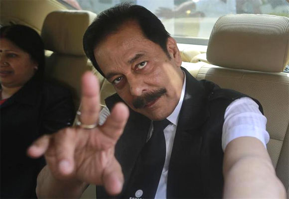 Sahara Group Chairman Subrata Roy gestures as he arrives at the Securities and Exchange Board of India (SEBI) headquarters in Mumbai.