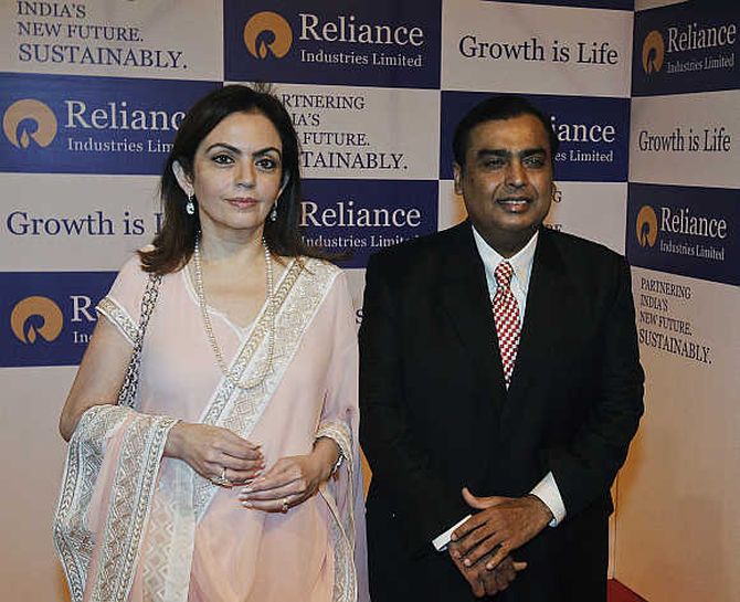 RIL chairman Mukesh Ambani with his wife Nita Ambani.at the company's AGM.