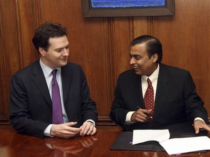 Mukesh Ambani after signing an agreement to sell stake in 21 oil blocks  to BP in August 2011.