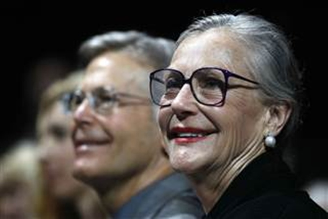 Wal-Mart Stores family members Jim Walton (L) and Alice Walton are introduced at the annual shareholders meeting for Wal-Mart in Fayetteville, Arkansas.
