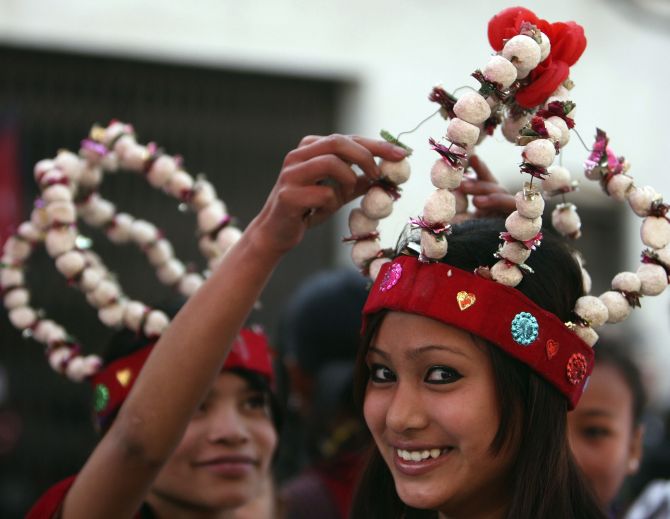 Gurung girls wearing traditional dresses take part in a New Year parade in Kathmandu.