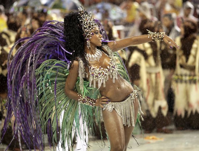 Drum Queen Cris Vianna of the Grande Rio samba school participates in the second night of the annual Carnival parade in Rio de Janeiro.