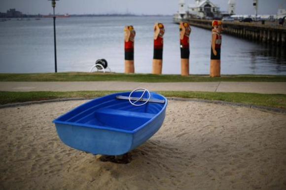 A children's playground ride in the shape of a boat is seen along Geelong's waterfront.