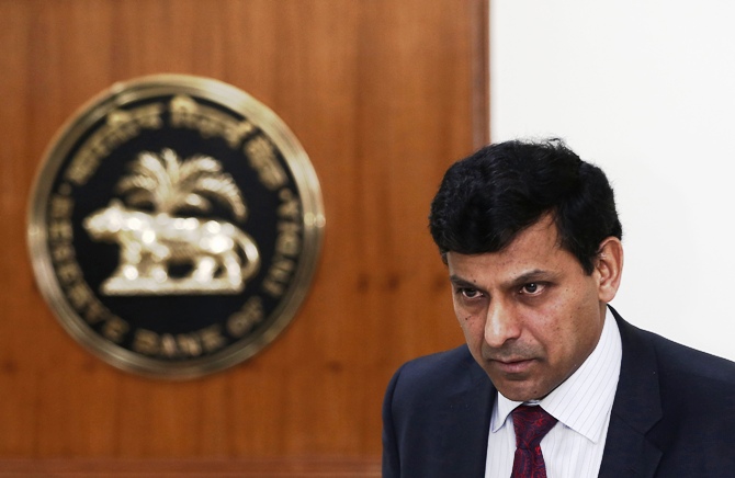 Reserve Bank of India (RBI) Governor Raghuram Rajan attends a joint news conference with India's Finance Minister Palaniappan Chidambaram (not pictured) in New Delhi March 7, 2014.