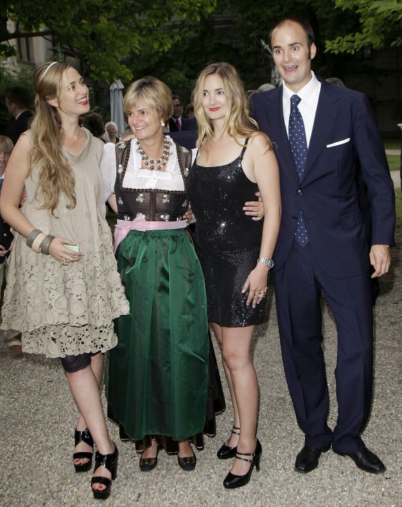 Prince Albert von Thurn und Taxis (R) and mother princess Gloria von Thurn und Taxis (2nd L) and her daughters Maria Theresia (2nd R) and Elisabeth (L) attend the Thurn and Taxis castle festival opening.
