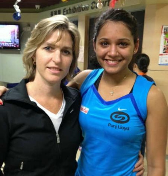 Dipika Pallikal with her coach.