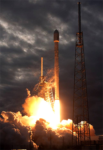 SpaceX rocket taking off to deliver cargo to International Space Station.