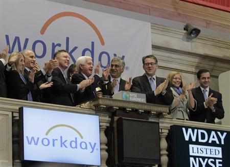 Co-CEO Aneel Bhusri (4th from left) ring the opening bell with company executives in celebration of the company's IPO at the New York Stock Exchange, October 12, 2012. 