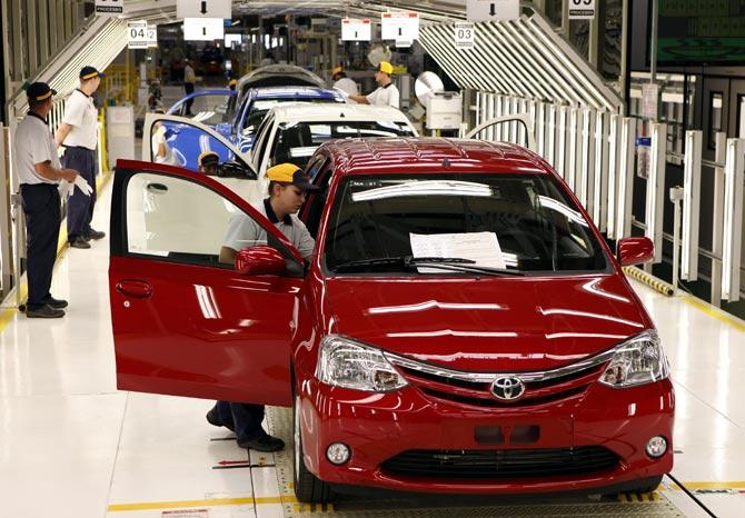 Security guards manning Toyota's India unit after staff refused to resume work.