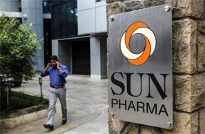 An employee speaks on phone as he walks out of research and development centre of Sun Pharmaceutical. Photograph: Danish Siddiqui/Reuters