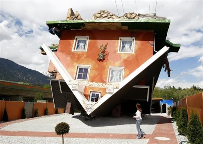 Visit two amazing upside-down houses!