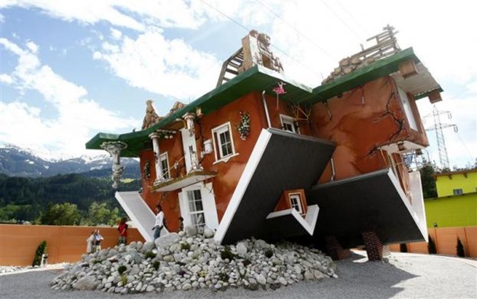 Visit two amazing upside-down houses!