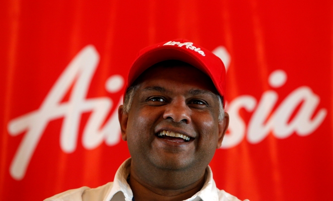 AirAsia Group CEO Tony Fernandes smiles during a news conference in Mumbai.