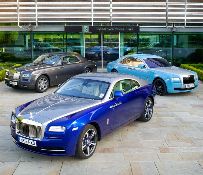 Rolls-Royce Phantom Coupe (left), Ghost (right) and Wraith (front).