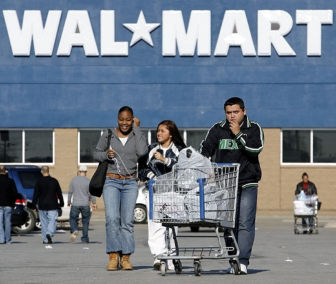 Shoppers leave a Wal-Mart store in Niles, Illinois.