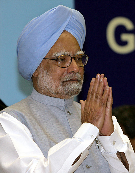 India's Prime Minister Manmohan Singh gestures during the national communal harmony awards ceremony in New Delhi.