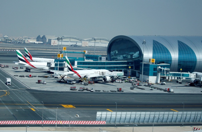 Emirates Airlines aircraft are seen near concourse A at the Emirates Terminal at Dubai International Airport.