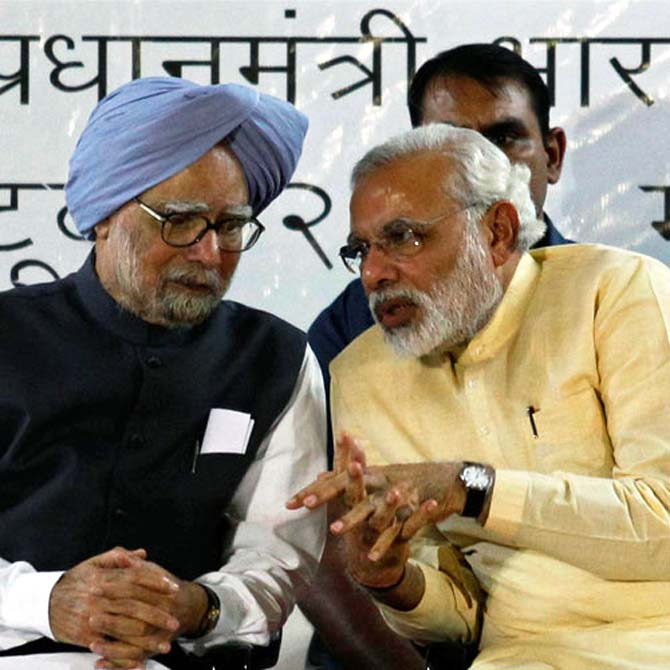 Prime Minister Manmohan Singh with PM designate Narendra Modi.