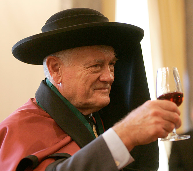Lithuania's President Valdas Adamkus smiles during his appointment as a gentleman of the confraternity of Porto's wine.