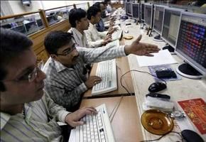 Traders work at a stock exchange.