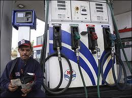 A worker at a petrol pump.