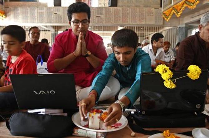 Traders work at a stock exchange.