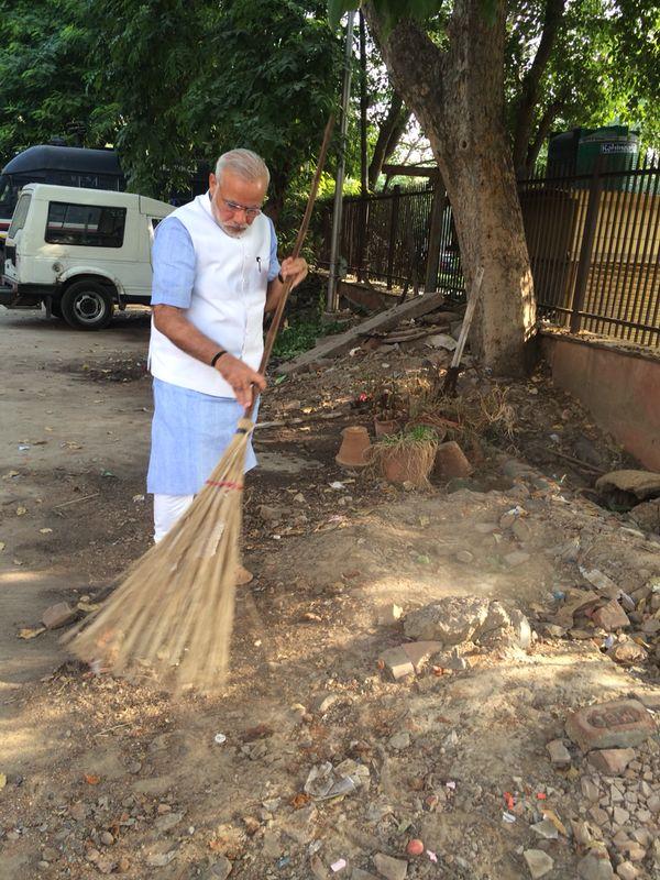 Prime Minister Narendra Modi launches the Swachh Bharat Mission.