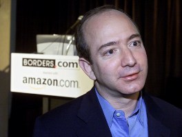 This file photo shows Amazon.com CEO Jeff Bezos talking with reporters at a press conference in New York.