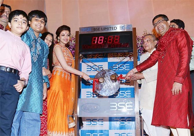 Image: Ashish Chauhan, CEO of the Bombay Stock Exchange with Kajal Agarwal during the Muhurat Trading session. Photograph, courtesy: BSE. 