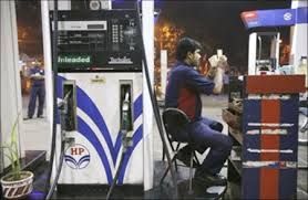 A worker at a petrol pump.
