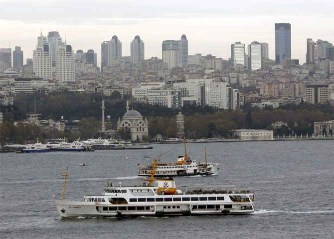 Ferries transport people between European and Asian sides of the city in Istanbul.