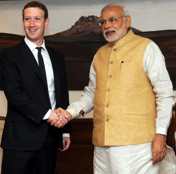 Image: Mark Zuckerberg meets Prime Minister Narendra Modi in New Delhi on October 10, 2014. Photograph: PIB. 