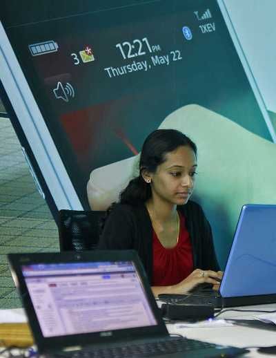 An employee works on her laptop at the Start-up Village in Kinfra High Tech Park in Kochi.
